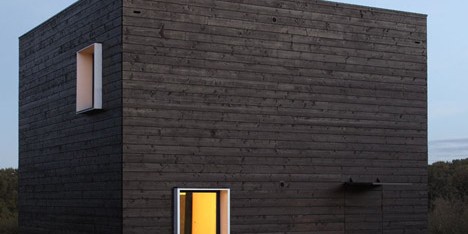 House in Normandy with blackened timber walls by Beckmann-N’Thépé Architectes