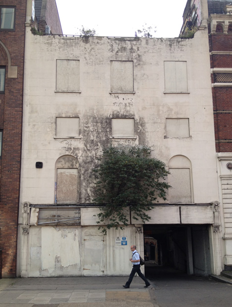 Miner on the Moon by Alex Chinneck is an upside-down building in London