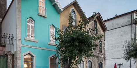 Portuguese townhouse meets Alpine chalet at this renovation by Tiago do Vale Arquitectos