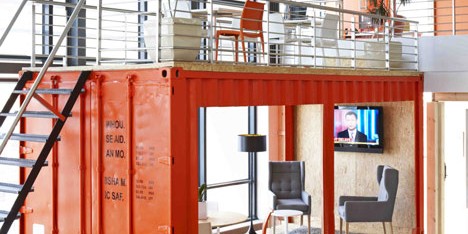 99c offices by Inhouse Brand Architects features a waiting room inside a shipping container