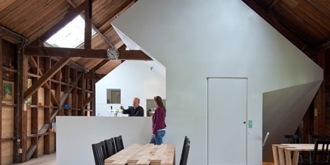 Bureau SLA inserts bright white gallery into old timber armoury