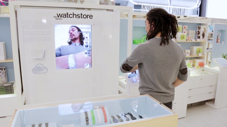 Alex Lambert tries on designs at the virtual watch store