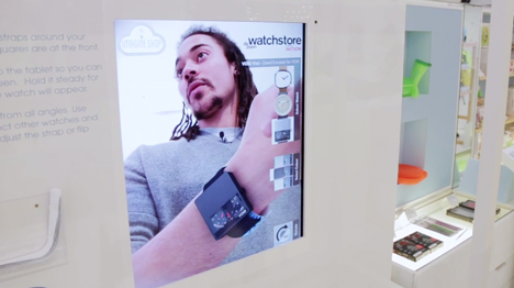 Alex Lambert tries on designs at the virtual watch store