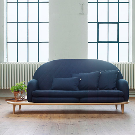Base of Rise sofa by Note Design Studio extends to form a side table