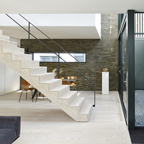 Blackbox mews house by Form_art Architects has brick walls inside and out