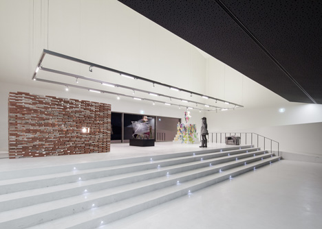 Casa das Artes bright red cultural centre by Future Architecture Thinking