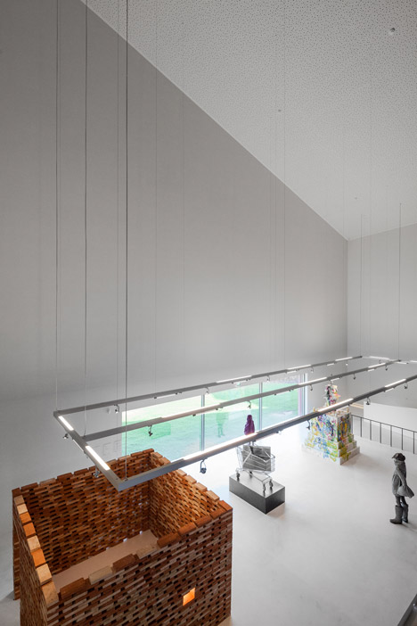 Casa das Artes bright red cultural centre by Future Architecture Thinking