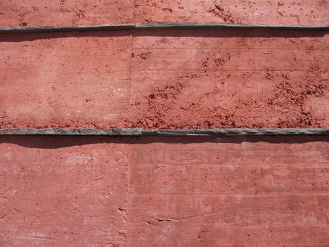 Red concrete visitor centre by Gonçalo Byrne tells the story of the Battle of Atoleiros