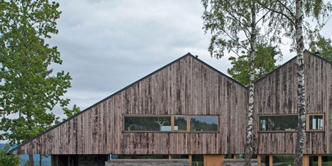 Double-gabled house overlooking a Norwegian fjord by Schjelderup Trondahl Architects