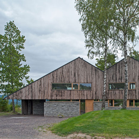 Double-gabled house overlooking a Norwegian fjord by Schjelderup Trondahl Architects
