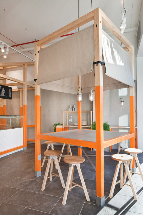 Foxes Den cafe by Hecker Guthrie references a chicken coop