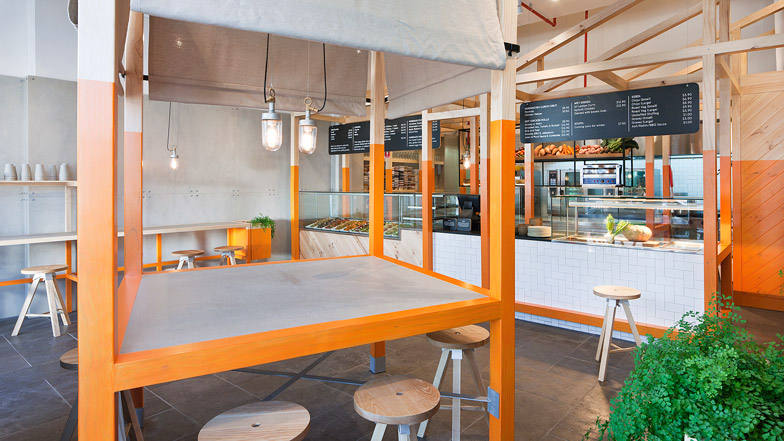 Foxes Den cafe by Hecker Guthrie references a chicken coop