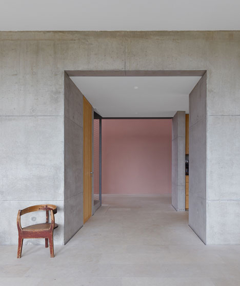 Stuttgart house by (se)arch with shingle-clad walls and a triple-height art gallery