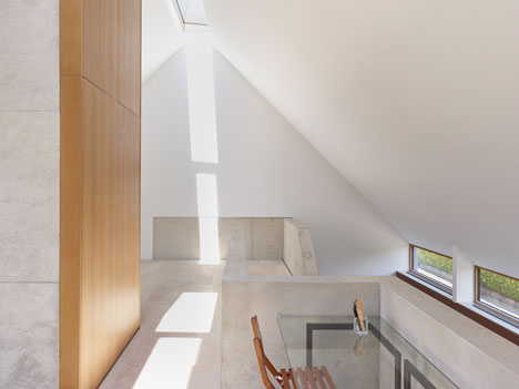 Stuttgart house by (se)arch with shingle-clad walls and a triple-height art gallery