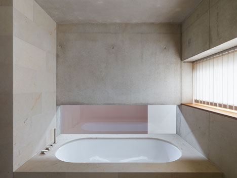 Stuttgart house by (se)arch with shingle-clad walls and a triple-height art gallery