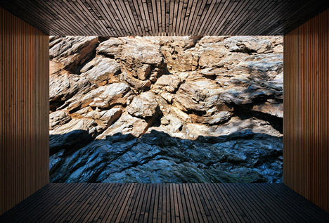 Woodland retreat by Béres Architects nestles up against a jagged rock face