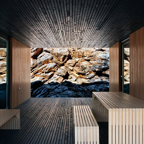 Woodland retreat by Béres Architects nestles up against a jagged rock face