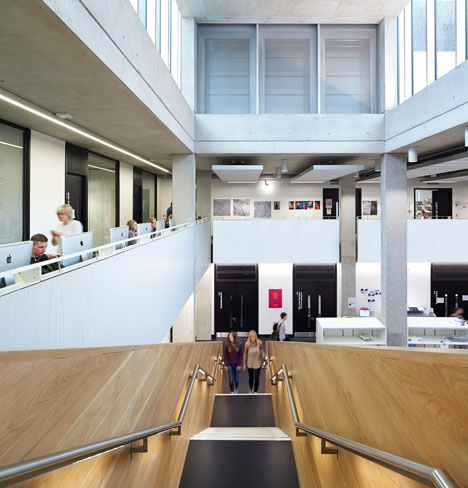 Manchester Metropolitan University art school extension with wooden stairs and bridges by Feilden Clegg Bradley Studios