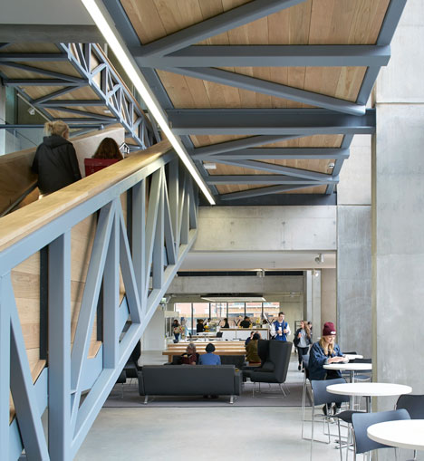 Manchester Metropolitan University art school extension with wooden stairs and bridges by Feilden Clegg Bradley Studios