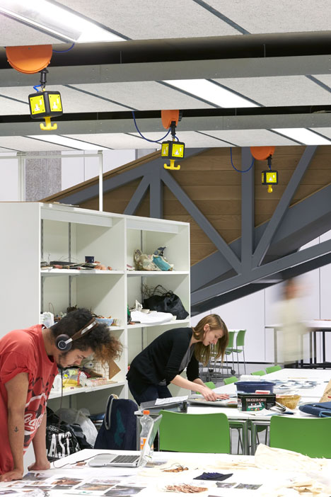 Manchester Metropolitan University art school extension with wooden stairs and bridges by Feilden Clegg Bradley Studios