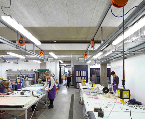 Manchester Metropolitan University art school extension with wooden stairs and bridges by Feilden Clegg Bradley Studios