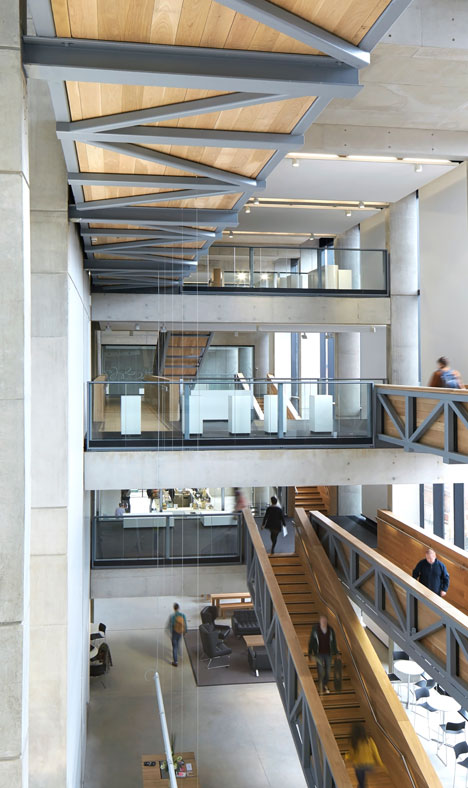 Manchester Metropolitan University art school extension with wooden stairs and bridges by Feilden Clegg Bradley Studios
