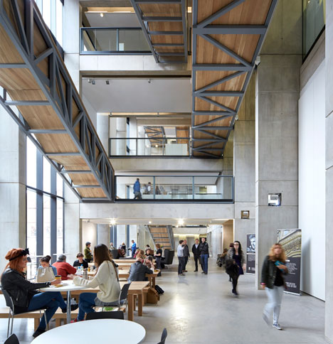 Manchester Metropolitan University art school extension with wooden stairs and bridges by Feilden Clegg Bradley Studios