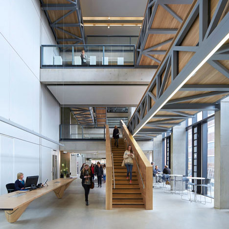 Manchester Metropolitan University art school extension with wooden stairs and bridges by Feilden Clegg Bradley Studios