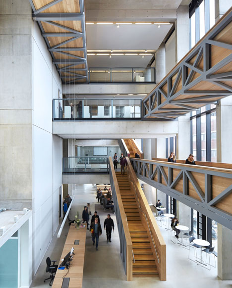 Manchester Metropolitan University art school extension with wooden stairs and bridges by Feilden Clegg Bradley Studios