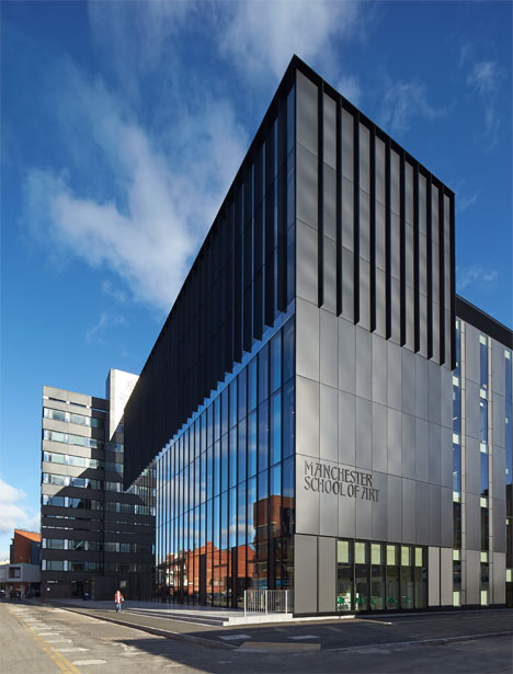 Manchester Metropolitan University art school extension with wooden stairs and bridges by Feilden Clegg Bradley Studios