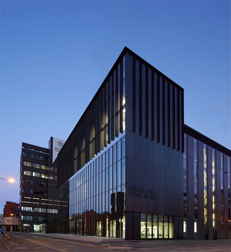 Manchester Metropolitan University art school extension with wooden stairs and bridges by Feilden Clegg Bradley Studios