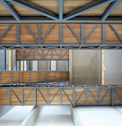 Manchester Metropolitan University art school extension with wooden stairs and bridges by Feilden Clegg Bradley Studios