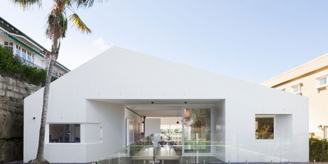 Renovated single-storey house with distorted ceiling voids by Tribe Studio