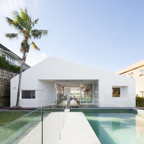 Renovated single-storey house with distorted ceiling voids by Tribe Studio