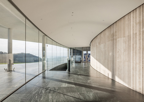 Southcape golf clubhouse by Mass Studies features curving concrete canopies