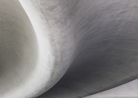 Southcape golf clubhouse by Mass Studies features curving concrete canopies