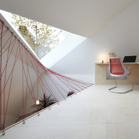 Parachute cables form netted balustrades at Fraher Architects’ London studio