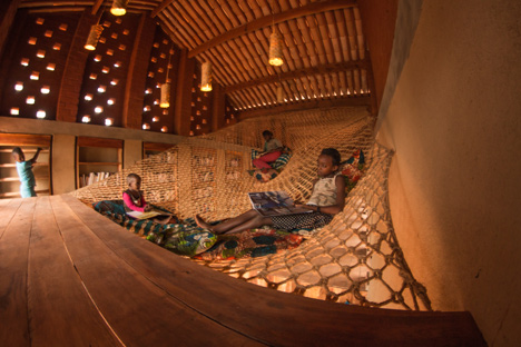 Children's library in Africa with rammed earth walls by BC Architects