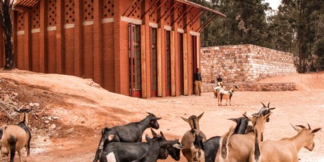 Children's library in Africa with rammed earth walls by BC Architects