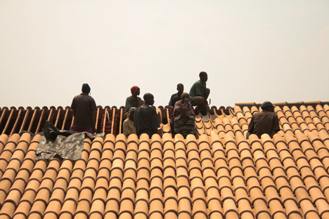 Children's library in Africa with rammed earth walls by BC Architects