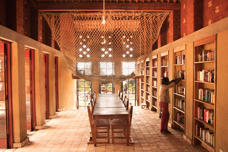 Children's library in Africa with rammed earth walls by BC Architects