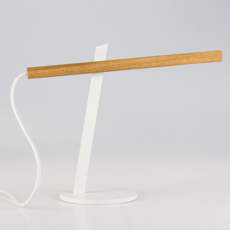 Two-piece magnetic Magnon desk lamp by Ilya Tkach