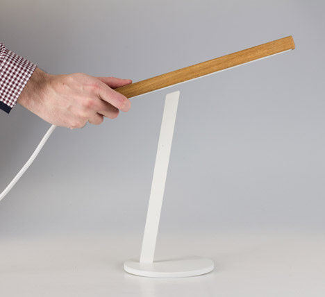Two-piece magnetic Magnon desk lamp by Ilya Tkach