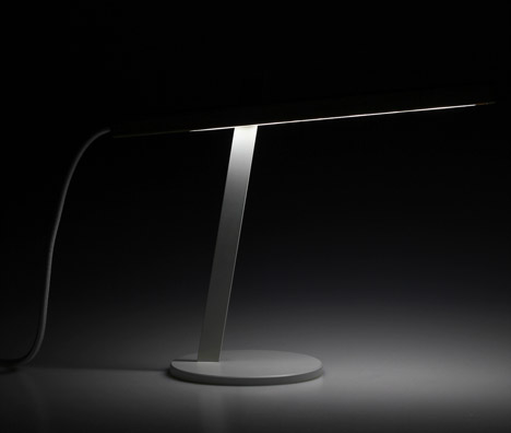Two-piece magnetic Magnon desk lamp by Ilya Tkach