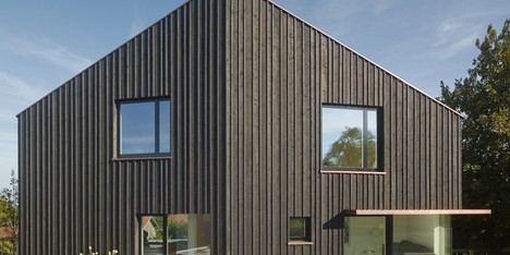 s_DenK house by SoHo Architektur has a kinked facade