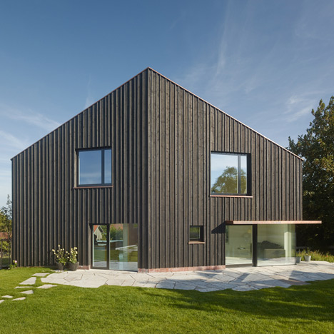 s_DenK house by SoHo Architektur has a kinked facade