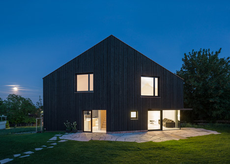 s_DenK house by SoHo Architektur has a kinked facade