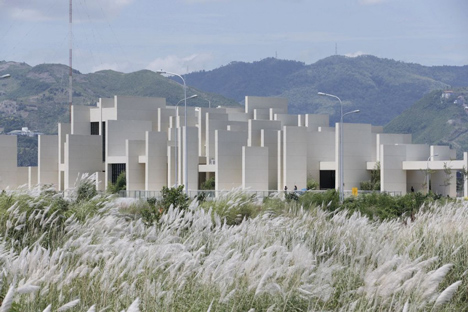 CAZA's 100 Walls Church is surrounded by staggered walls and partitions