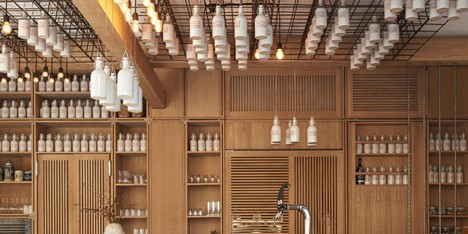 Buero Wagner suspends bottles of foraged ingredients from ceiling of cocktail bar
