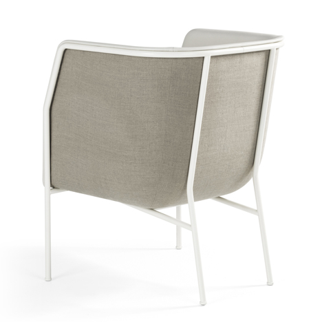 Cajal sofas and armchair by Gunilla Allard balance the seat on a thin metal frame